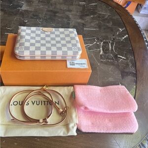 Louis Vuitton Double Zip pochette.  Brand new with original receip.